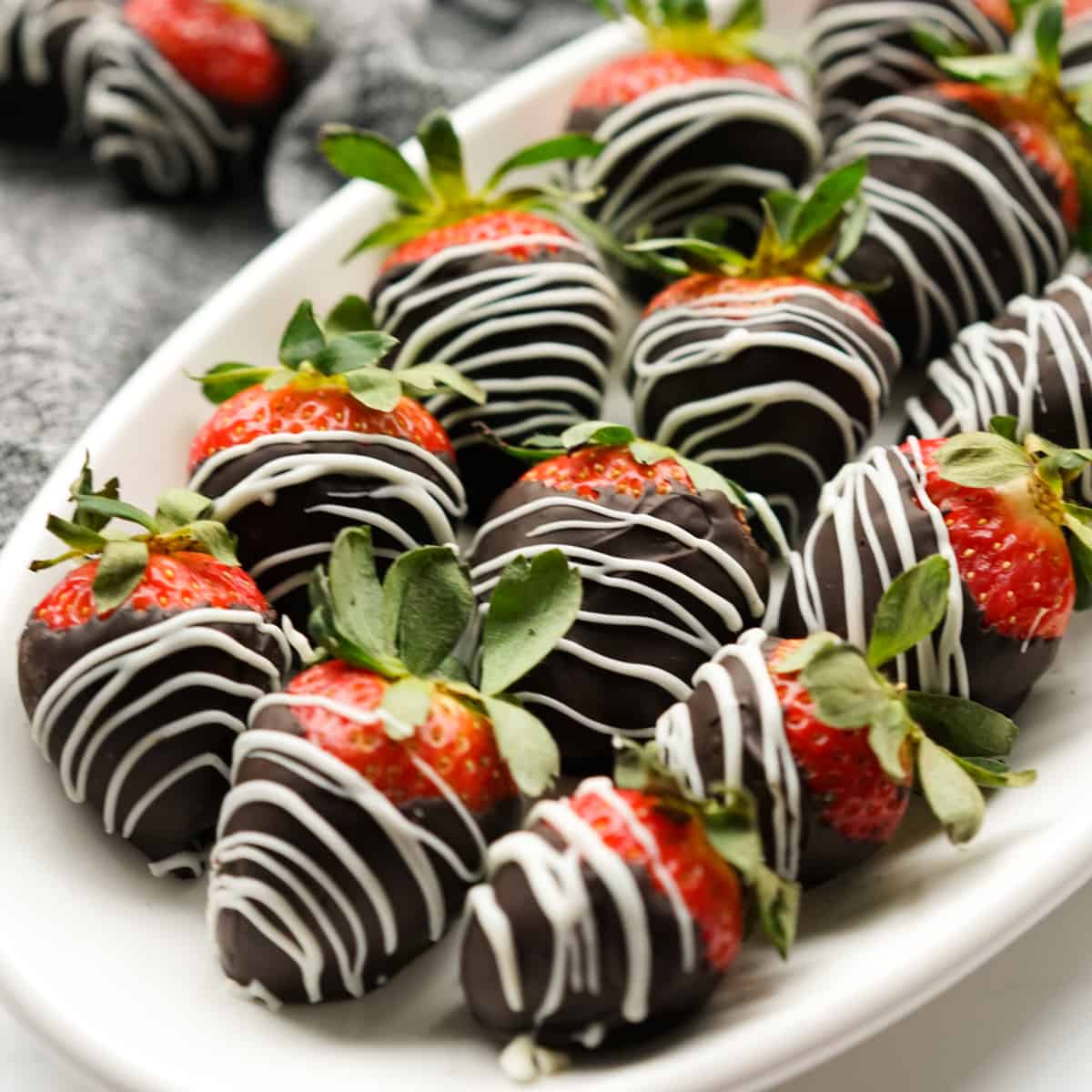 Chocolate-covered strawberries arranged for dessert