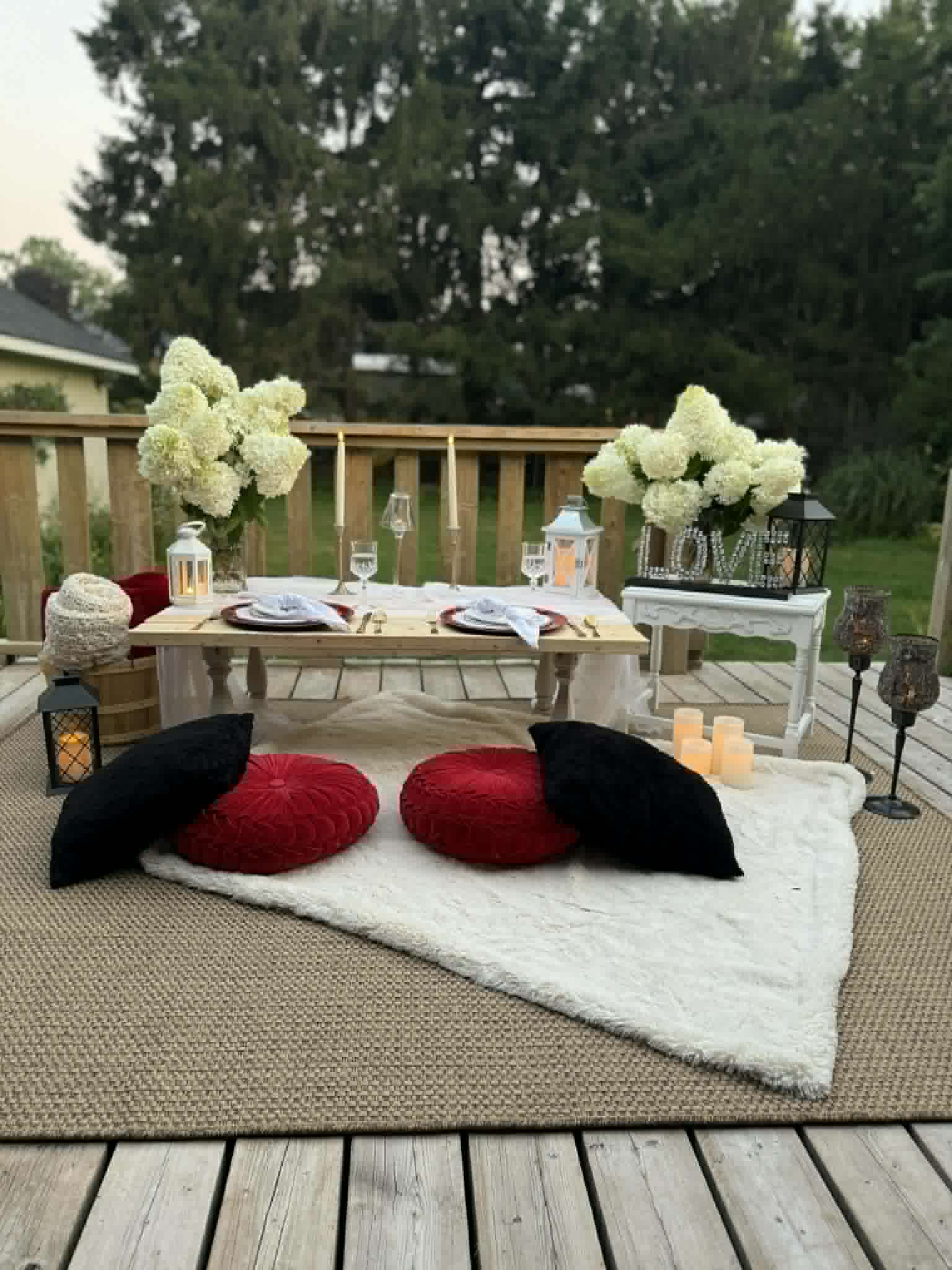 The Glimmering Experience picnic setup with premium romantic styling